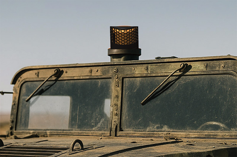 Small light beacon mounted on the roof of a military vehicle